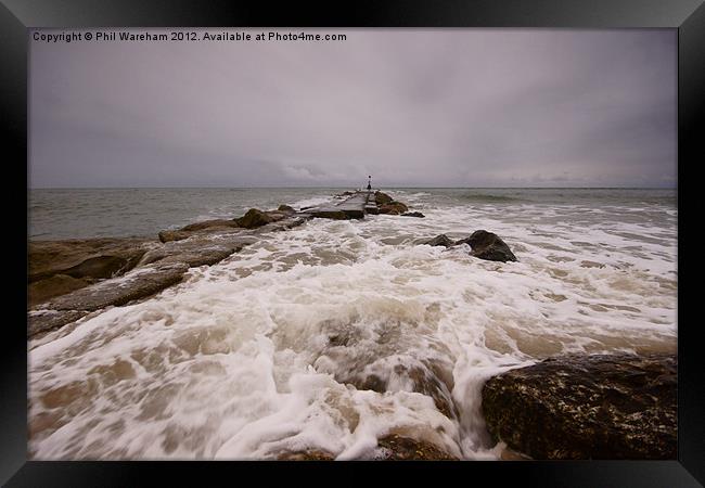 Wave on the breakwater Framed Print by Phil Wareham