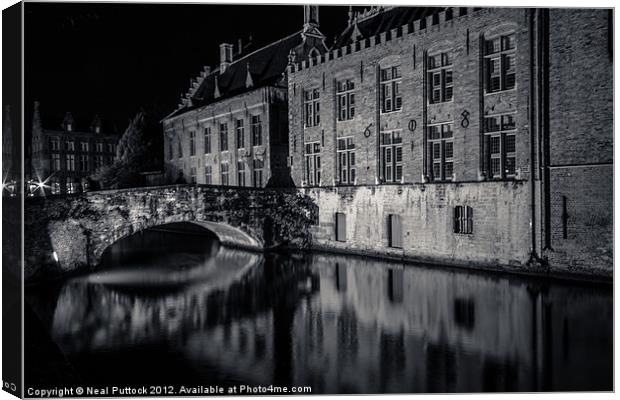 Bruges at Night Canvas Print by Neal P