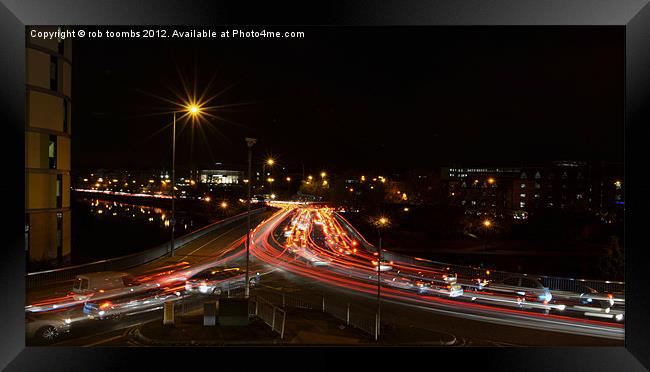 RUSH HOUR Framed Print by Rob Toombs