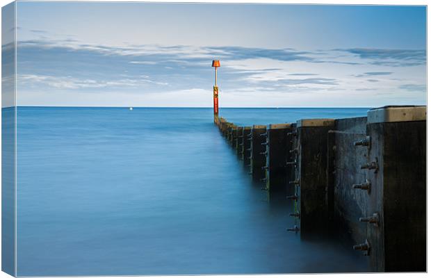 Bournemouth groyne at Sundown Canvas Print by Ian Middleton