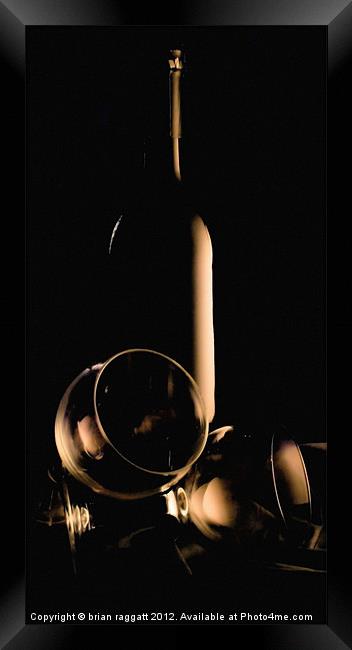 Bottle of wine and glasses Framed Print by Brian  Raggatt