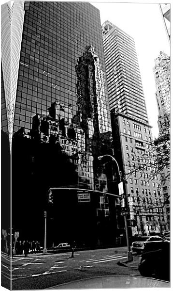 Manhattan Reflection Canvas Print by Jed Pearson