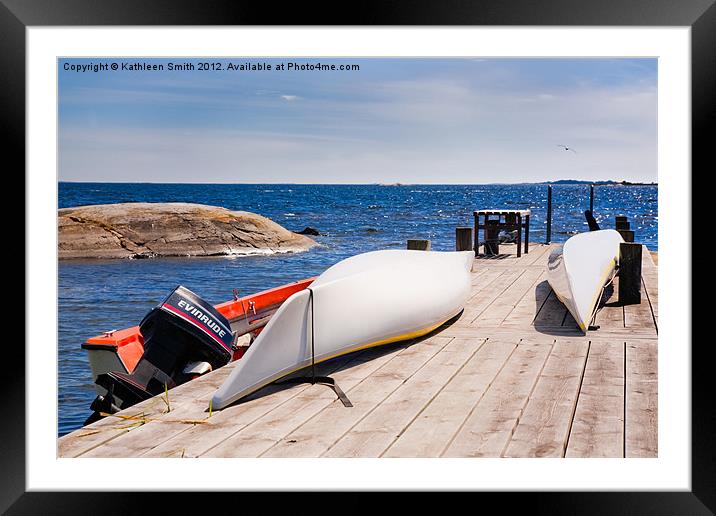 Kayaks on a jetty Framed Mounted Print by Kathleen Smith (kbhsphoto)
