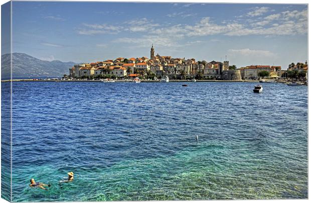 Swimming in Korcula Canvas Print by Tom Gomez