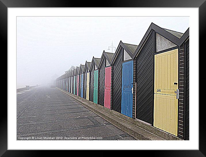 Beach Huts in the fog. Framed Mounted Print by Lilian Marshall
