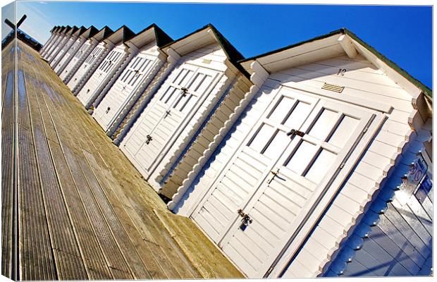 Eastbourne Beach Huts Canvas Print by Phil Clements