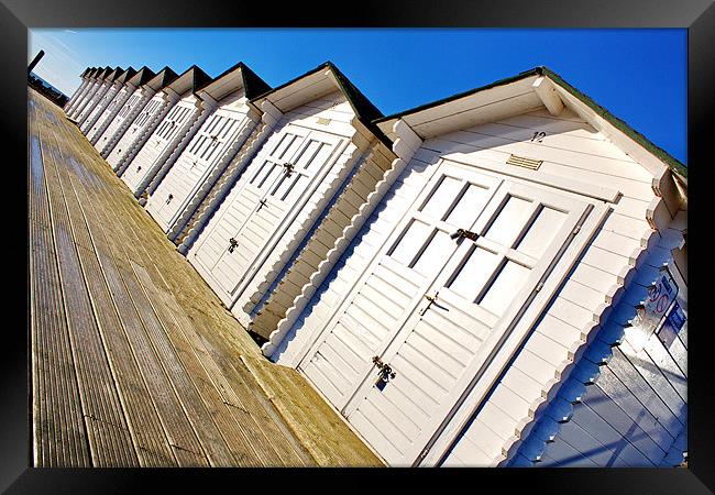 Eastbourne Beach Huts Framed Print by Phil Clements