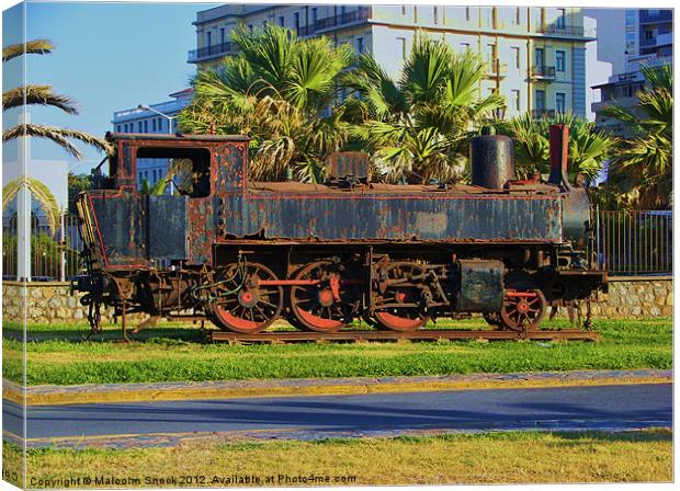 Rusting steam engine Canvas Print by Malcolm Snook