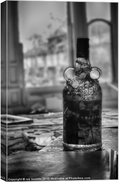 AN OLD BOTTLE OF RUM Canvas Print by Rob Toombs