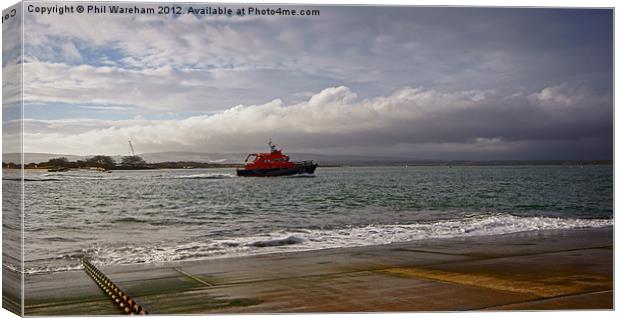 A Lifeboat Returns Canvas Print by Phil Wareham