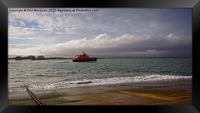 A Lifeboat Returns Framed Print by Phil Wareham
