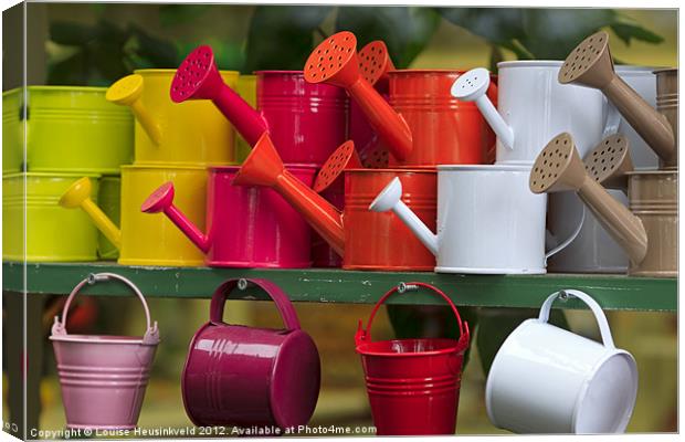 Colourful Watering Cans Canvas Print by Louise Heusinkveld