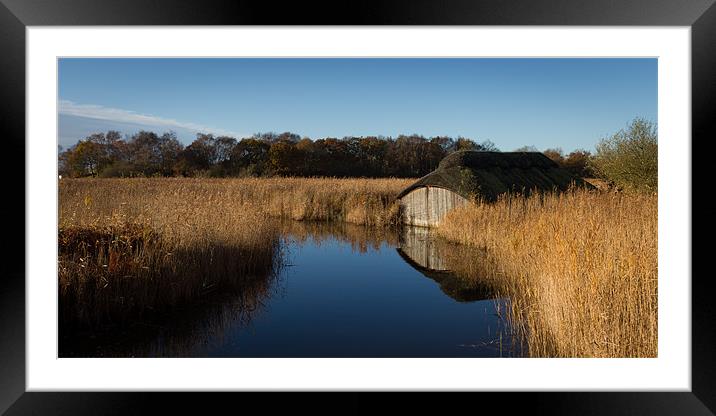 Hickling Boat Shed Framed Mounted Print by Simon Wrigglesworth