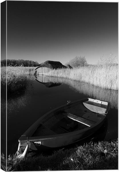 Hickling Rowing Boat Canvas Print by Simon Wrigglesworth