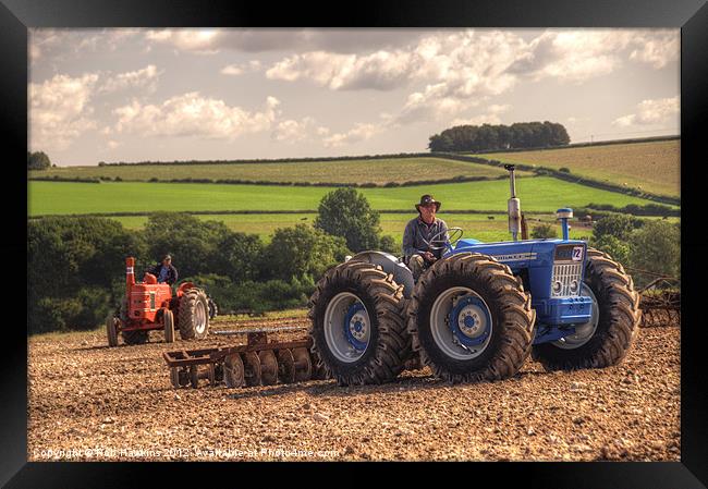 Classic Tractors at work Framed Print by Rob Hawkins