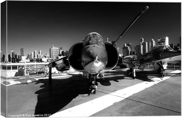 Jet in the City Canvas Print by Rob Hawkins