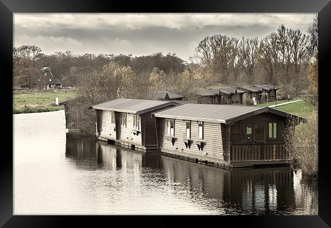 Wooden Boathouses Framed Print by Stephen Mole