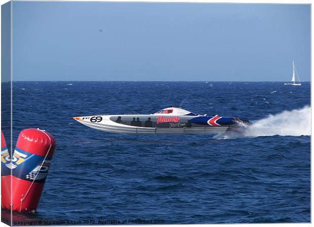 Offshore powerboat at speed Canvas Print by Malcolm Snook