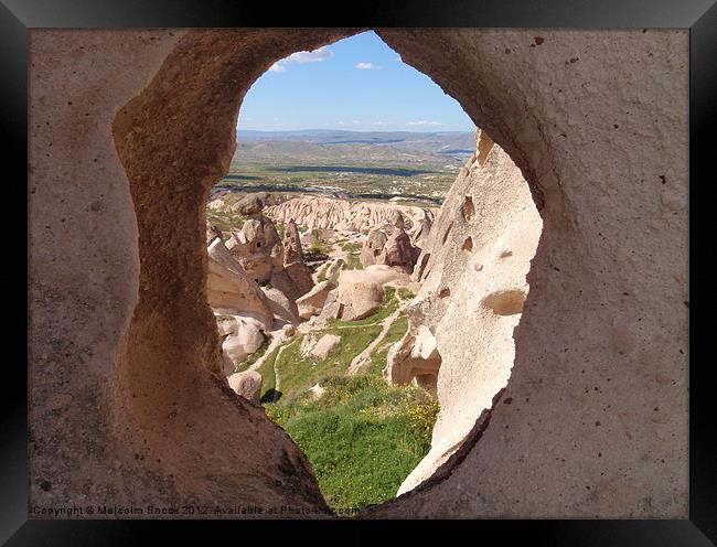 Rock houses in Capadoccia. Framed Print by Malcolm Snook