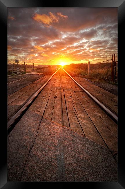 Sunrise on the Line Framed Print by Michael Baldwin