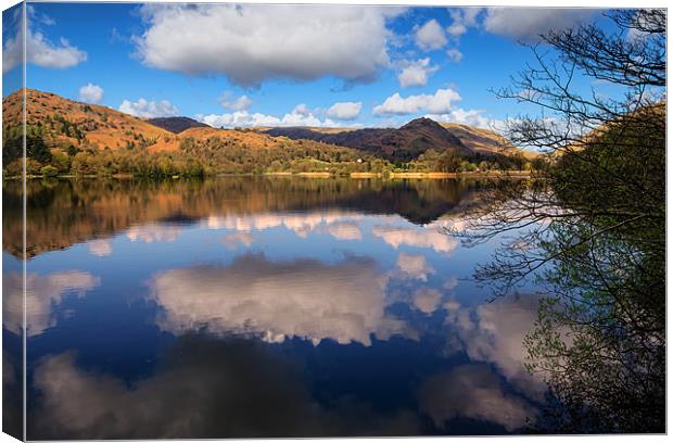 Reflections Of Grasmere Canvas Print by John Hare