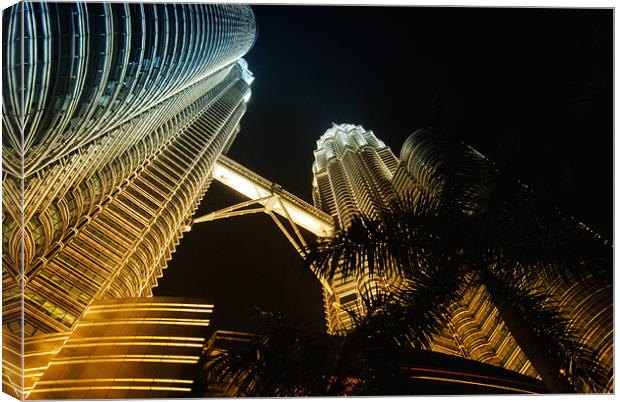 Petronas Towers in colour cast Canvas Print by Paul Fisher