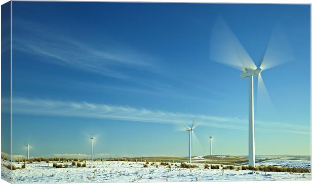 Wind Turbines in Motion Canvas Print by David Yeaman