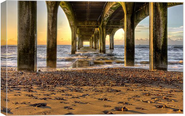Under the Pier at Sunrise Canvas Print by Jennie Franklin