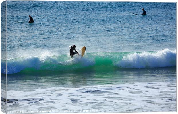 Surfers at Praa Sands, Cornwall Canvas Print by Louise Heusinkveld