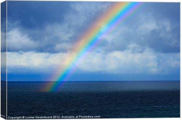 Rainbow over the Atlantic Ocean Canvas Print by Louise Heusinkveld