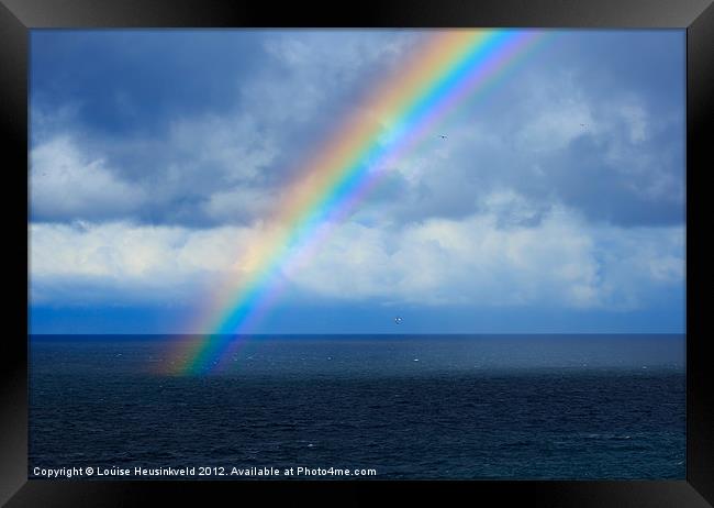 Rainbow over the Atlantic Ocean Framed Print by Louise Heusinkveld