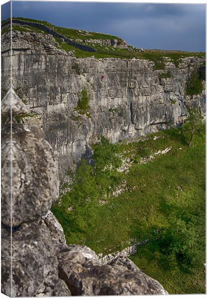 Rock Climbing in Malham Cove Canvas Print by Roger Green