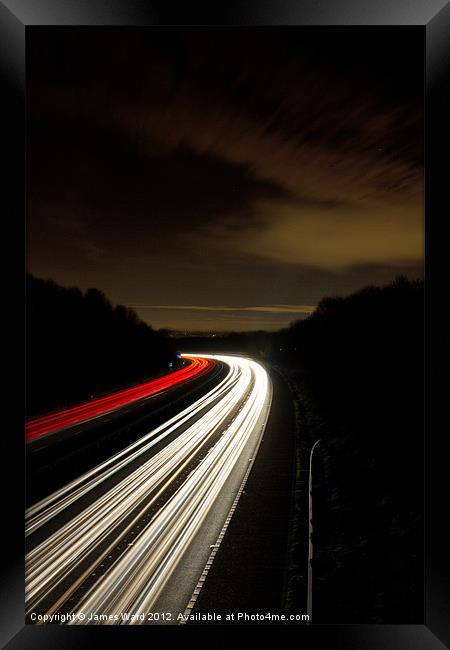Motorway light trails at Crawley, Sussex Framed Print by James Ward