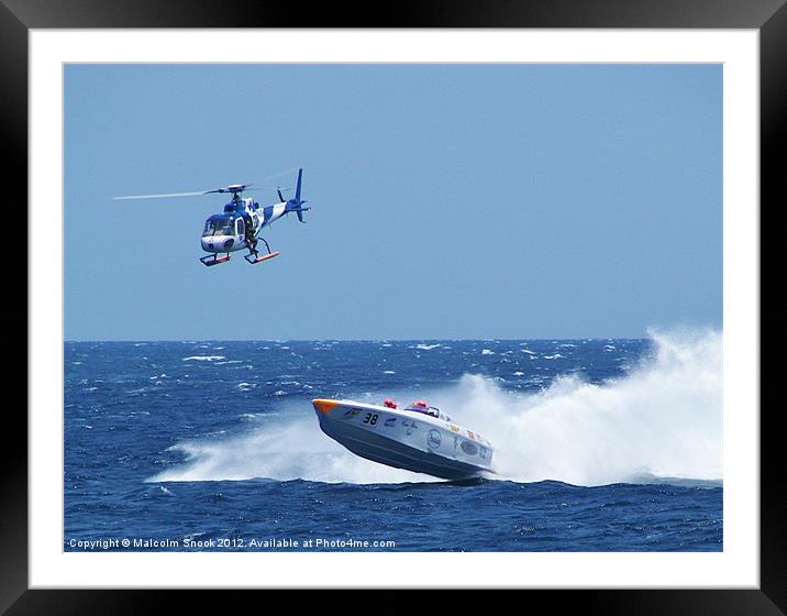 Powerboat and helicopter Framed Mounted Print by Malcolm Snook