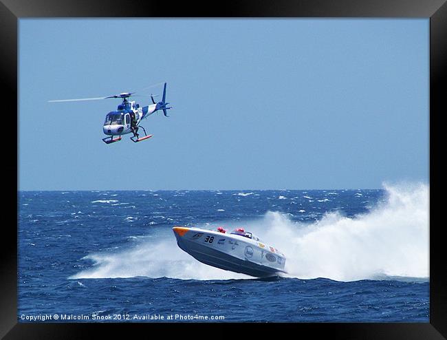 Powerboat and helicopter Framed Print by Malcolm Snook