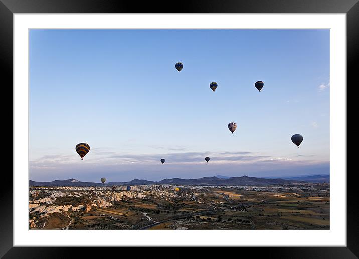 Cappadocia landscape filled with hot air balloons Framed Mounted Print by Arfabita  