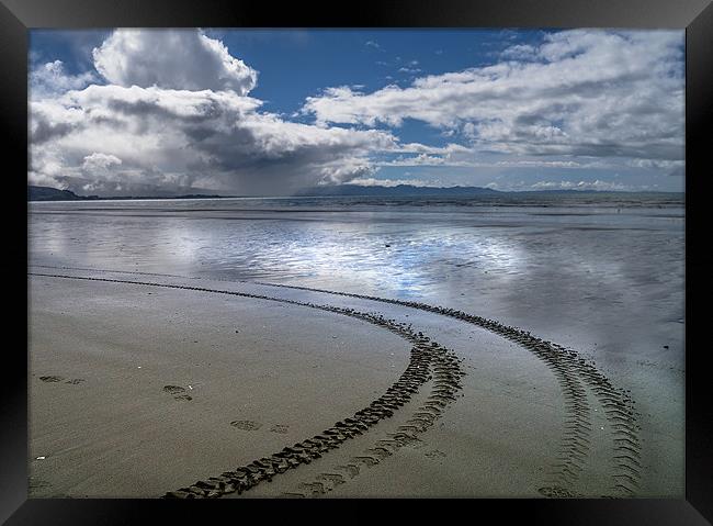 Tracks in the sand Framed Print by Richard Thomas