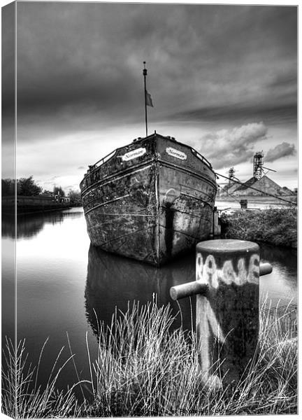 The sand barge tied up Canvas Print by David McFarland