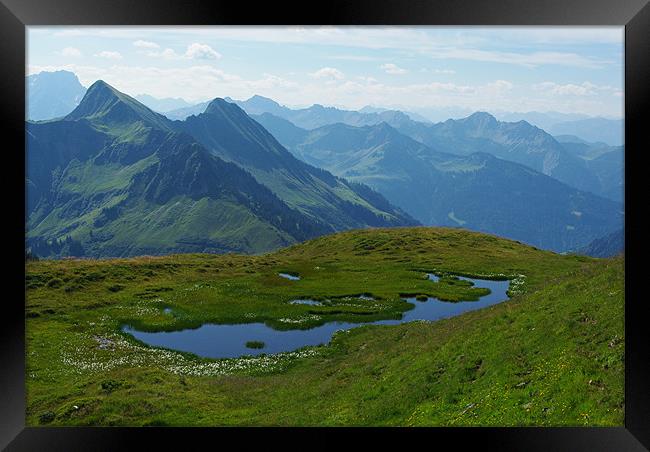 Mountain pond with a view near Furkajoch, Austria Framed Print by Claudio Del Luongo