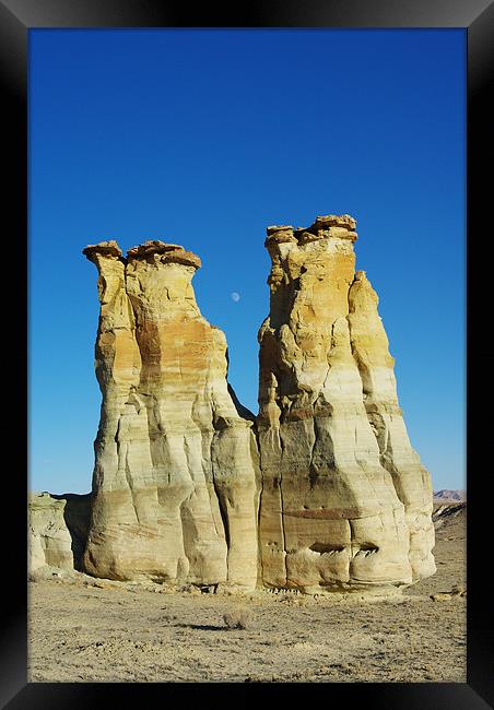 Rock towers and moon in secluded canyon valley, Ut Framed Print by Claudio Del Luongo