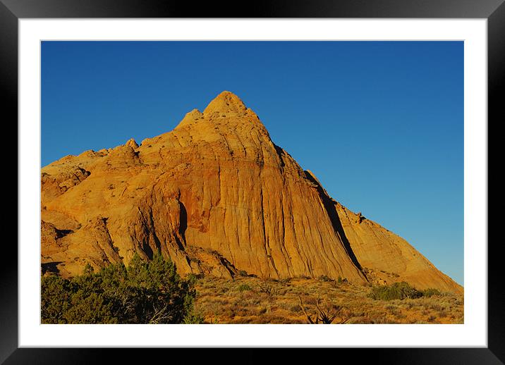 Rock hill in early morning light Framed Mounted Print by Claudio Del Luongo