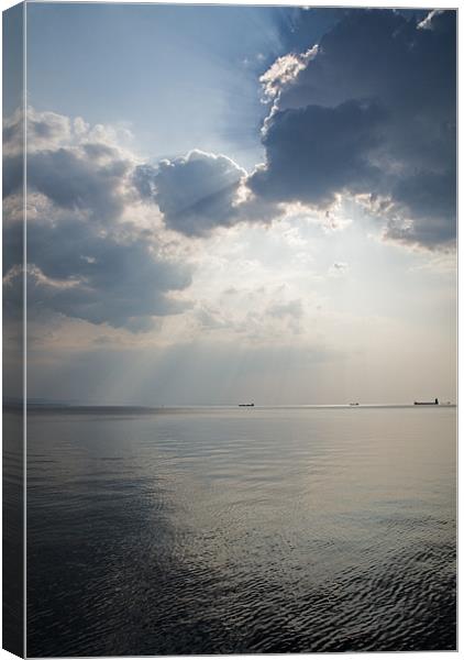 Sunrays scattered by clouds over Trieste Bay Canvas Print by Ian Middleton