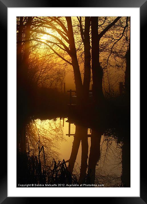 Sunrise with reflections Framed Mounted Print by Debbie Metcalfe