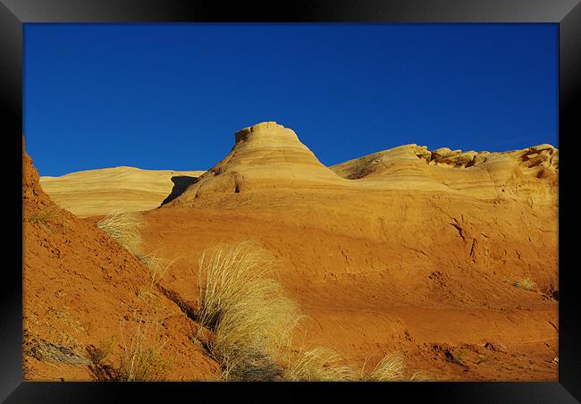 Orange hills and blue sky Framed Print by Claudio Del Luongo