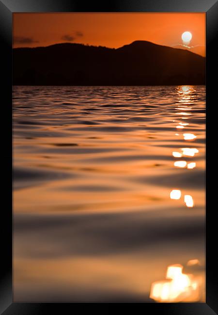 Sunset over lake in Dornoch Framed Print by Steven Brown