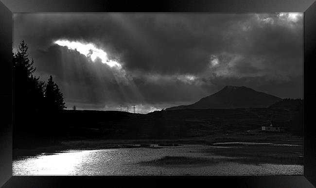Sun Beams Over Llyn Sarnau Framed Print by Brian Sharland