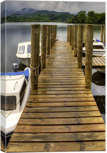 Wooden Pier at Derwentwater Canvas Print by Tom Gomez