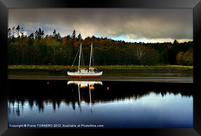 Boat waiting. Framed Print by Pierre TORNERO