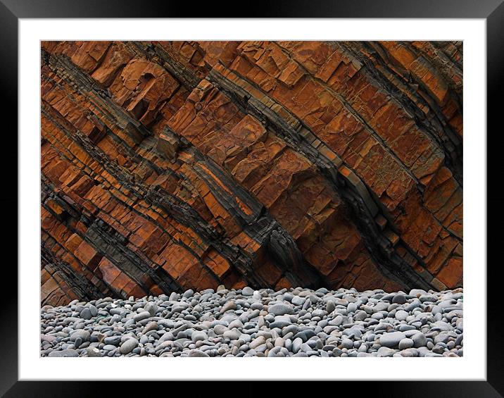 Orange Cliff Face & Grey Pebbles Framed Mounted Print by Dave Bell