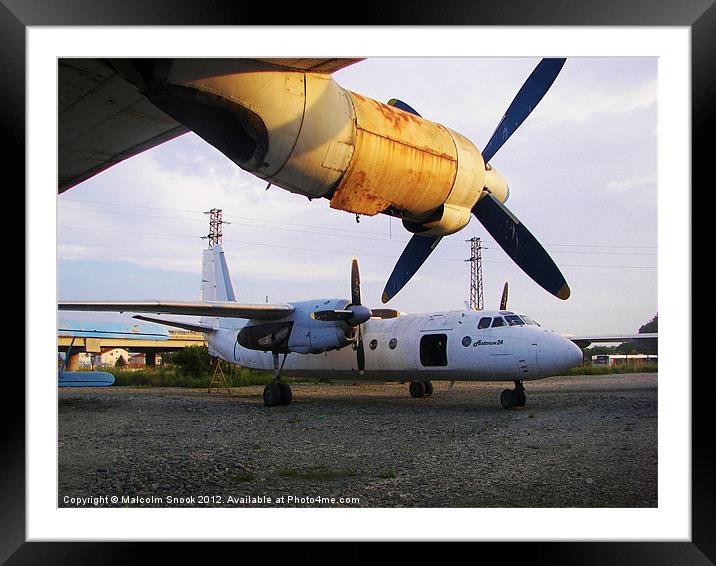 Aeroplane Graveyard Framed Mounted Print by Malcolm Snook